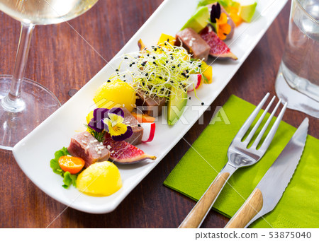 Plate of delicious roasted tuna Plate of delicious roasted tuna 53875040