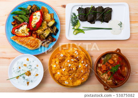 Traditional Bulgarian cuisine of grape rolls, vegetables and cabbage rolls served 53875082