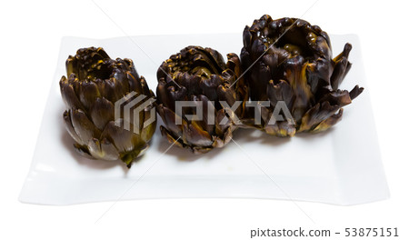 Baked whole artichokes Baked whole artichokes 53875151