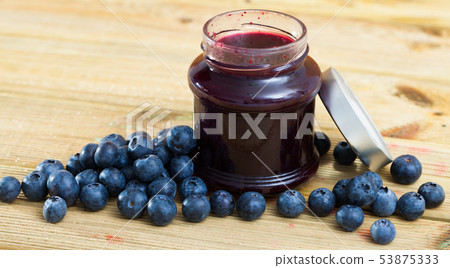 Whortleberry jam and fresh berries Whortleberry jam and fresh berries 53875333