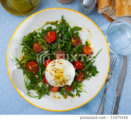 Salad with soft Burrata cheese Salad with soft Burrata cheese 53875436