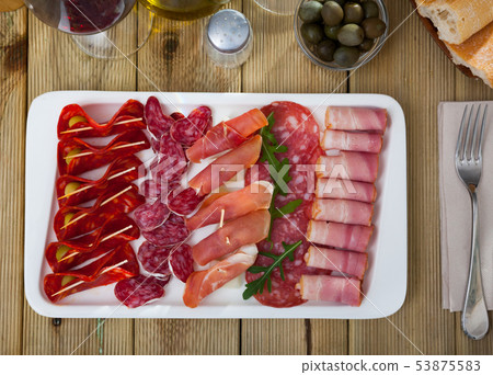 Top view of coldcuts of jamon, sausages, bacon Top view of coldcuts of jamon, sausages, bacon 53875583