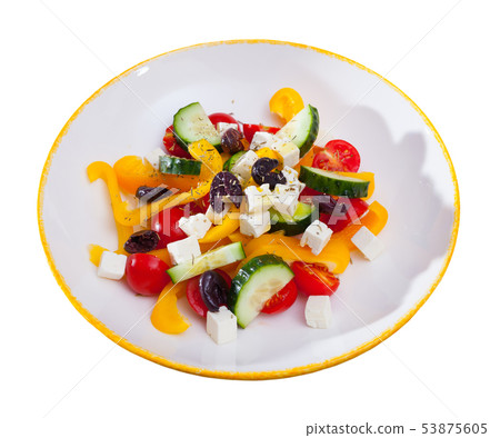 Delicious salad with tomatoes, cucumber, feta cheese and paprika Delicious salad with tomatoes, cucumber, feta cheese and paprika 53875605