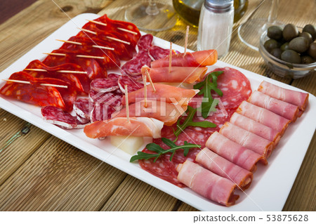 Spanish sausage sliced - chorizo, fuet, jamon, salami, bacon Spanish sausage sliced - chorizo, fuet, jamon, salami, bacon 53875628