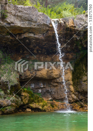 Waterfall in Catalonia surrounded by beautiful forests 53875760