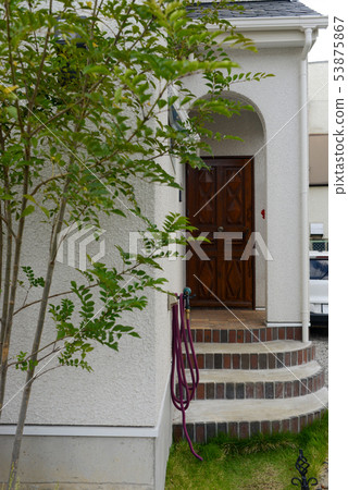 Entrance and garden tree Entrance and garden tree 53875867