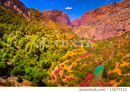 Road to the old beautiful and a very narrow bridge 53877552