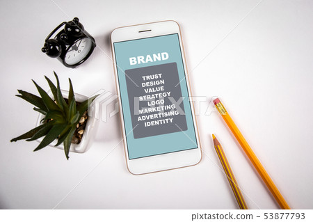 Brand concept. Smartphone on white table 53877793