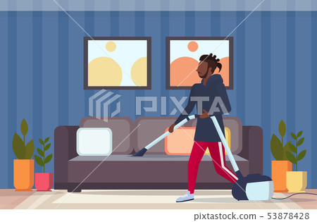 man using vacuum cleaner african american guy vacuuming couch doing housework housekeeping cleaning