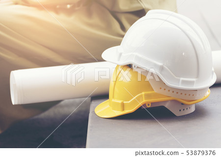 Safety helmet white yellow. Protection head safety Safety helmet white yellow. Protection head safety 53879376