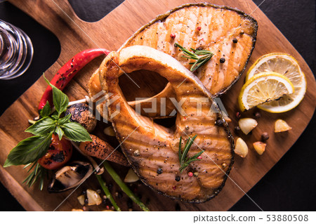 Grilled salmon fish with seasoning  53880508