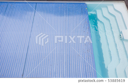 Swimming pool cover detail for protection and heat the water, pool roller-shutter covers Swimming pool cover detail for protection and heat the water, pool roller-shutter covers 53885619