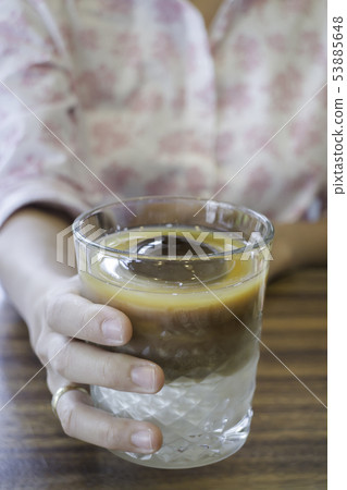 Enjoy coffee latte with iced ball Enjoy coffee latte with iced ball 53885648