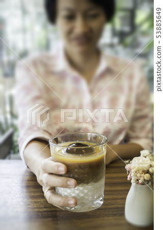 Enjoy coffee latte with iced ball 53885649