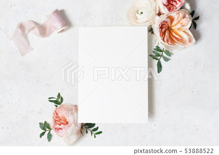 Feminine wedding, birthday stationery mock-up scene. Blank paper greeting card with bouquet of green 53888522