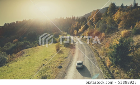 Mountain hill country road car drive aerial view 53888925