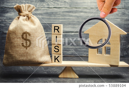 Money bag, blocks with the word Risk  53889104