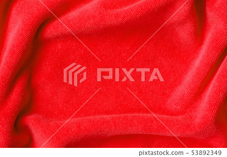 Red draped velvet textile 53892349