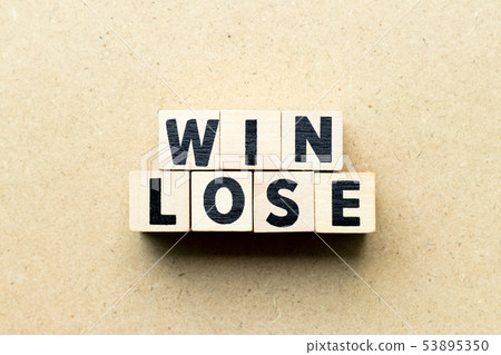 Letter block in word win lose on wood background Letter block in word win lose on wood background 53895350