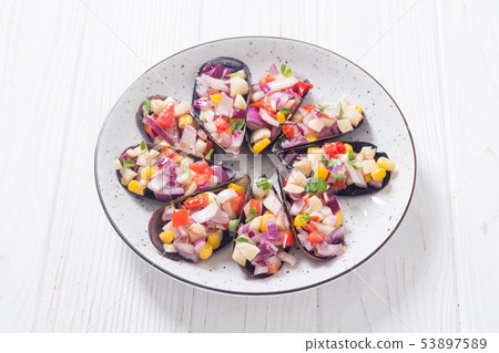 Traditional Peruvian food background with mussels Traditional Peruvian food background with mussels 53897589