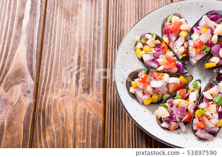 Traditional  Peruvian food background with mussels 53897590