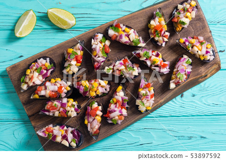 Traditional  Peruvian food background with mussels 53897592