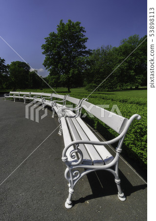 Group of white benches Group of white benches 53898113