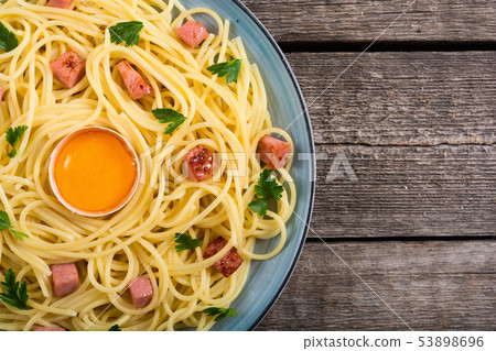 Itslian pasta carbonara with sausage and egg Itslian pasta carbonara with sausage and egg 53898696