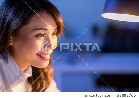 woman overtime work woman overtime work 53898769