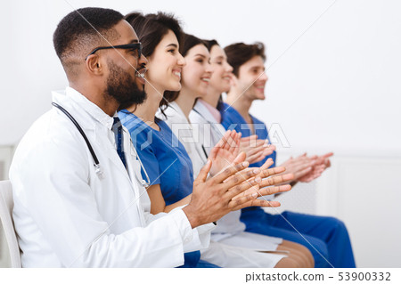 Doctors And Interns Clapping Hands At Conference 53900332