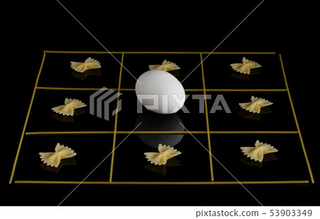 Pasta bows on a black background Pasta bows on a black background 53903349