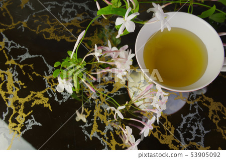 Relax with jasmine tea 53905092