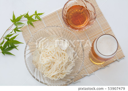 Somen and beer in a glass plate with white background 53907479