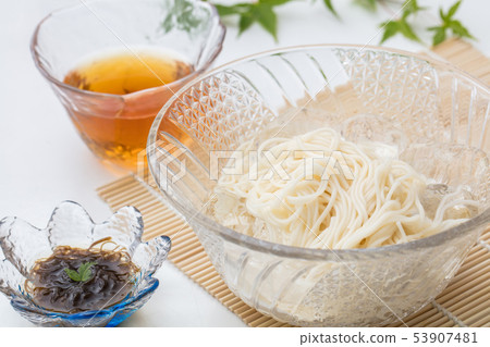 Some noodles in a glass plate with white background Some noodles in a glass plate with white background 53907481