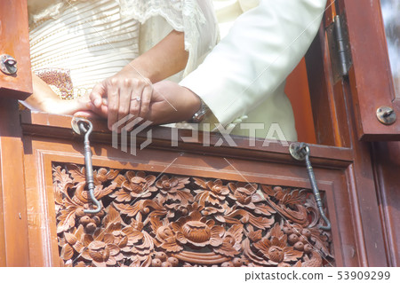 Thailand tradition. Wedding couple holding hands 53909299