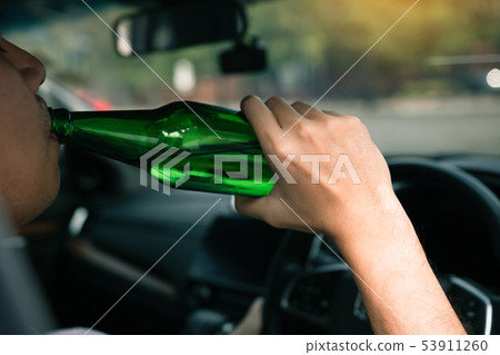 Asian men are breaking the traffic rules by Asian men are breaking the traffic rules by 53911260