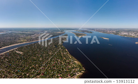 Aerial view on small town. Many houses, roads Aerial view on small town. Many houses, roads 53913112