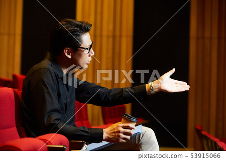 Young man stage director 53915066