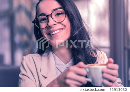 Joyful delighted woman being in a great mood Joyful delighted woman being in a great mood 53915080