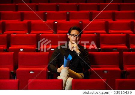 Young man stage director 53915429