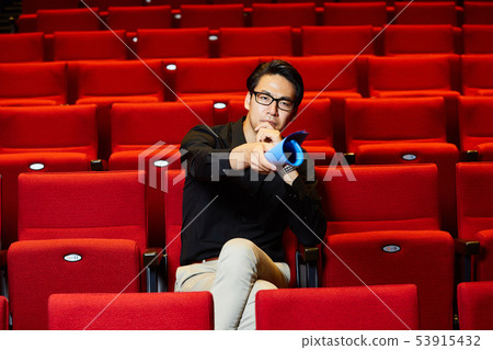 Young man stage director Young man stage director 53915432