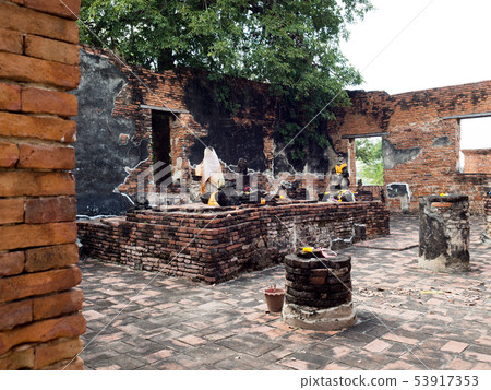 Buddha head in Wat Worachet, Ayutthaya, Thailand. Buddha head in Wat Worachet, Ayutthaya, Thailand. 53917353