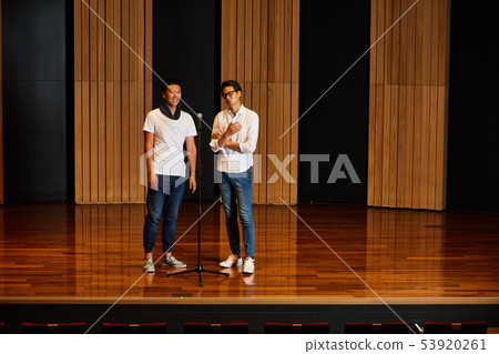 Young men stage practice Young men stage practice 53920261