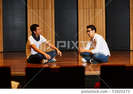 Young men stage practice Young men stage practice 53920273