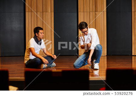 Young men stage practice Young men stage practice 53920276