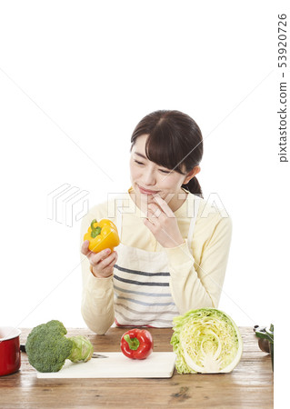 Housewife cooking 53920726