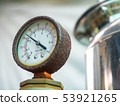 Water pressure gauge  with rust and pipes of a hom 53921265