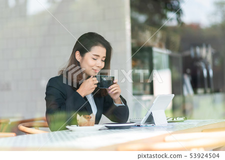 beautiful woman working in the cafe beautiful woman working in the cafe 53924504
