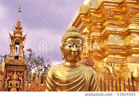 Pagodas and Buddha image of Thai Buddhist temple with golden color (Chiang Mai) Pagodas and Buddha image of Thai Buddhist temple with golden color (Chiang Mai) 53924565
