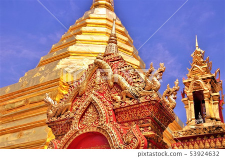 Pagodas / image of Thai Buddhist temple with golden color (Chiang Mai) Pagodas / image of Thai Buddhist temple with golden color (Chiang Mai) 53924632